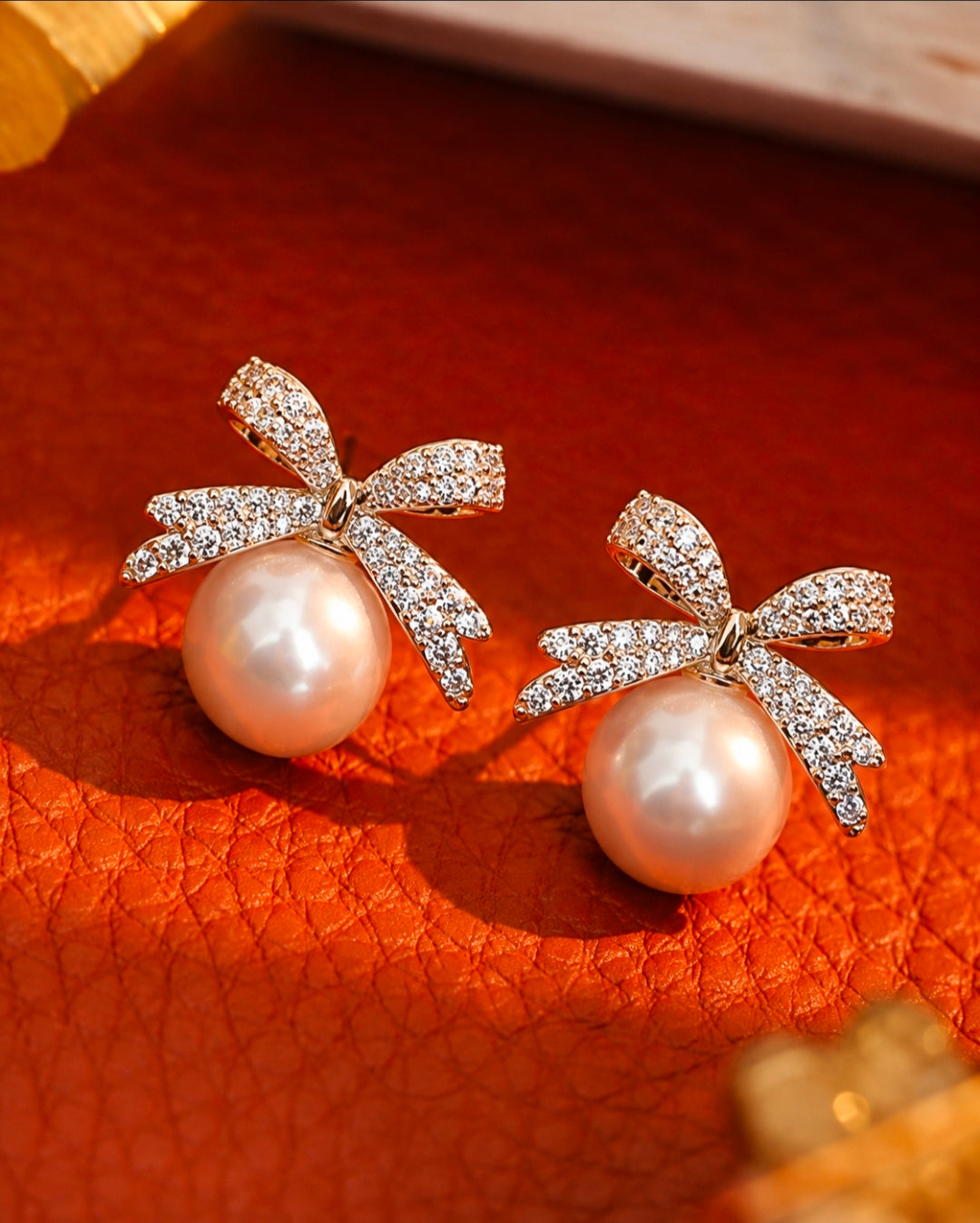 Gold Bow Pearl Stud Earrings – Pavé Cubic Zirconia Ribbon Studs